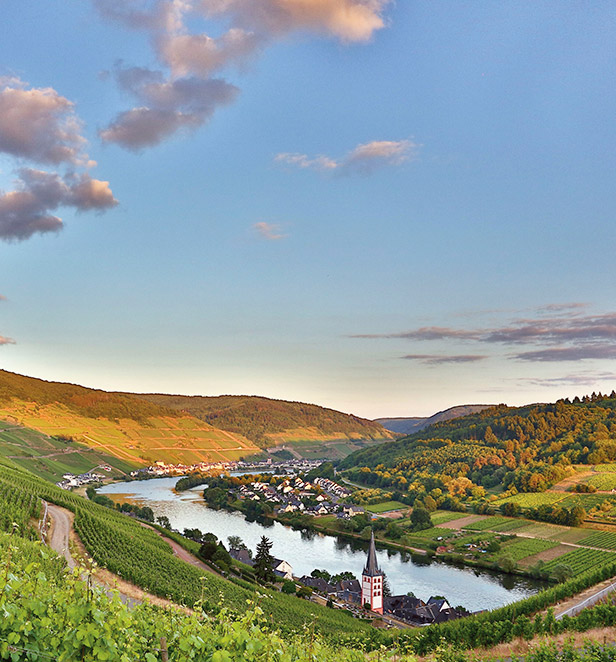 Green hills and village lining the Moselle Valley, Germany